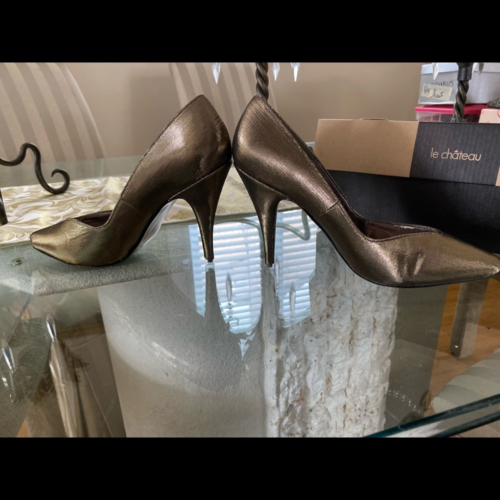 Gold fabric high heel shoes.